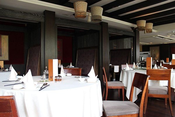 Private dining room in Hutong with elegant table settings for upscale events and meetings.
