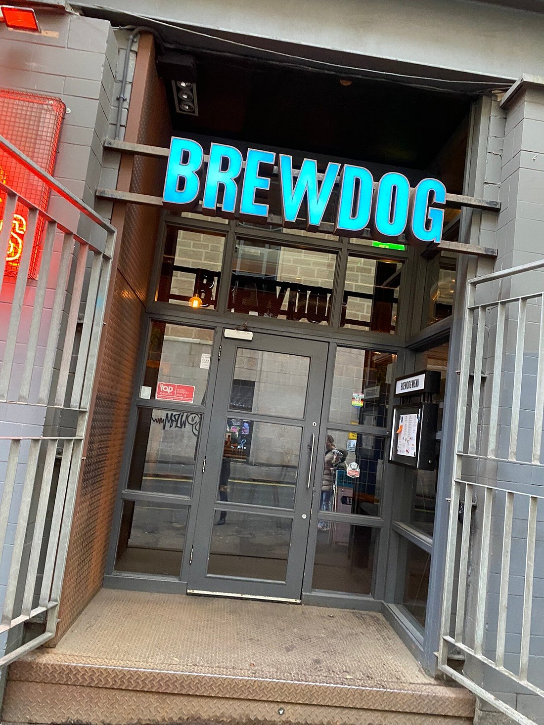 BrewDog Edinburgh beer garden entrance, modern design for casual events and networking.