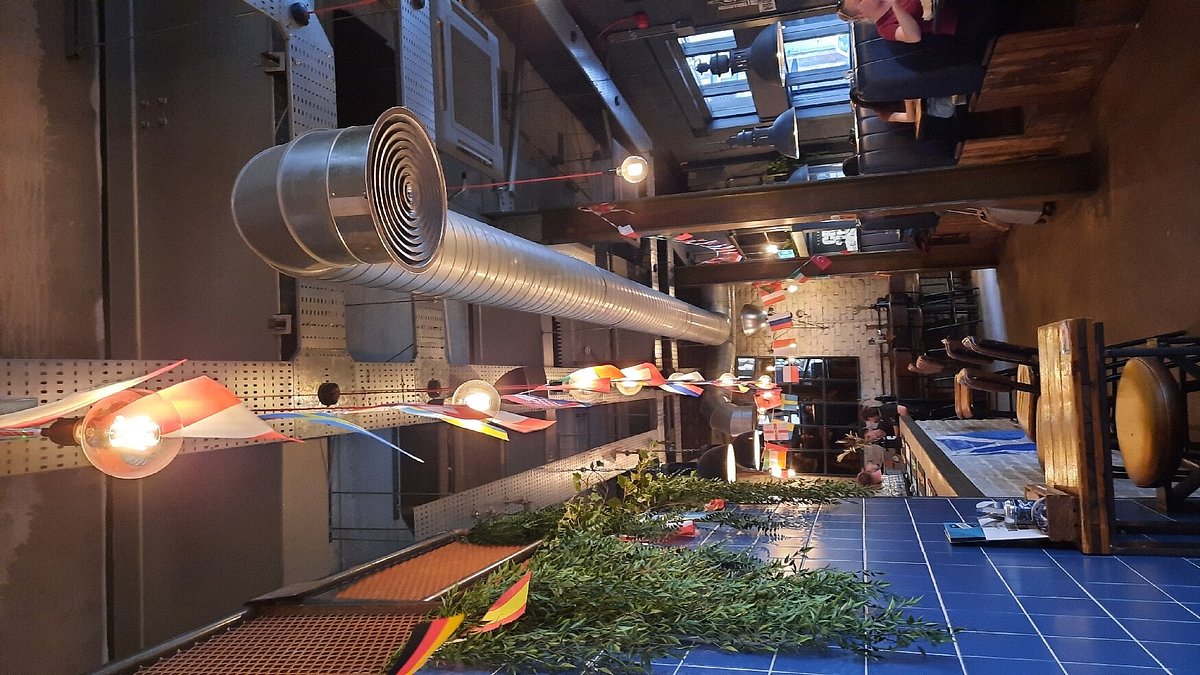 Vibrant BrewDog Edinburgh event space with industrial-chic design for gatherings.