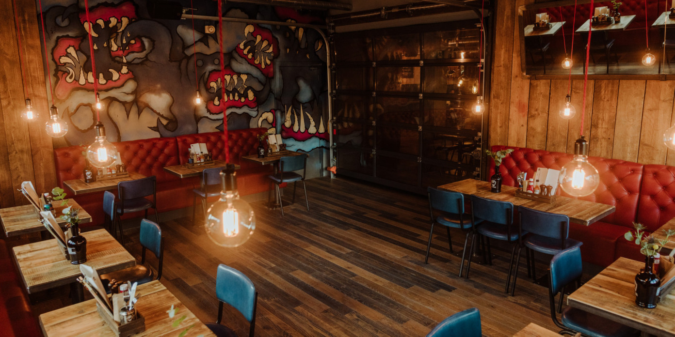 Trendy BrewDog Edinburgh bar with warm lighting, perfect for networking events and workshops.