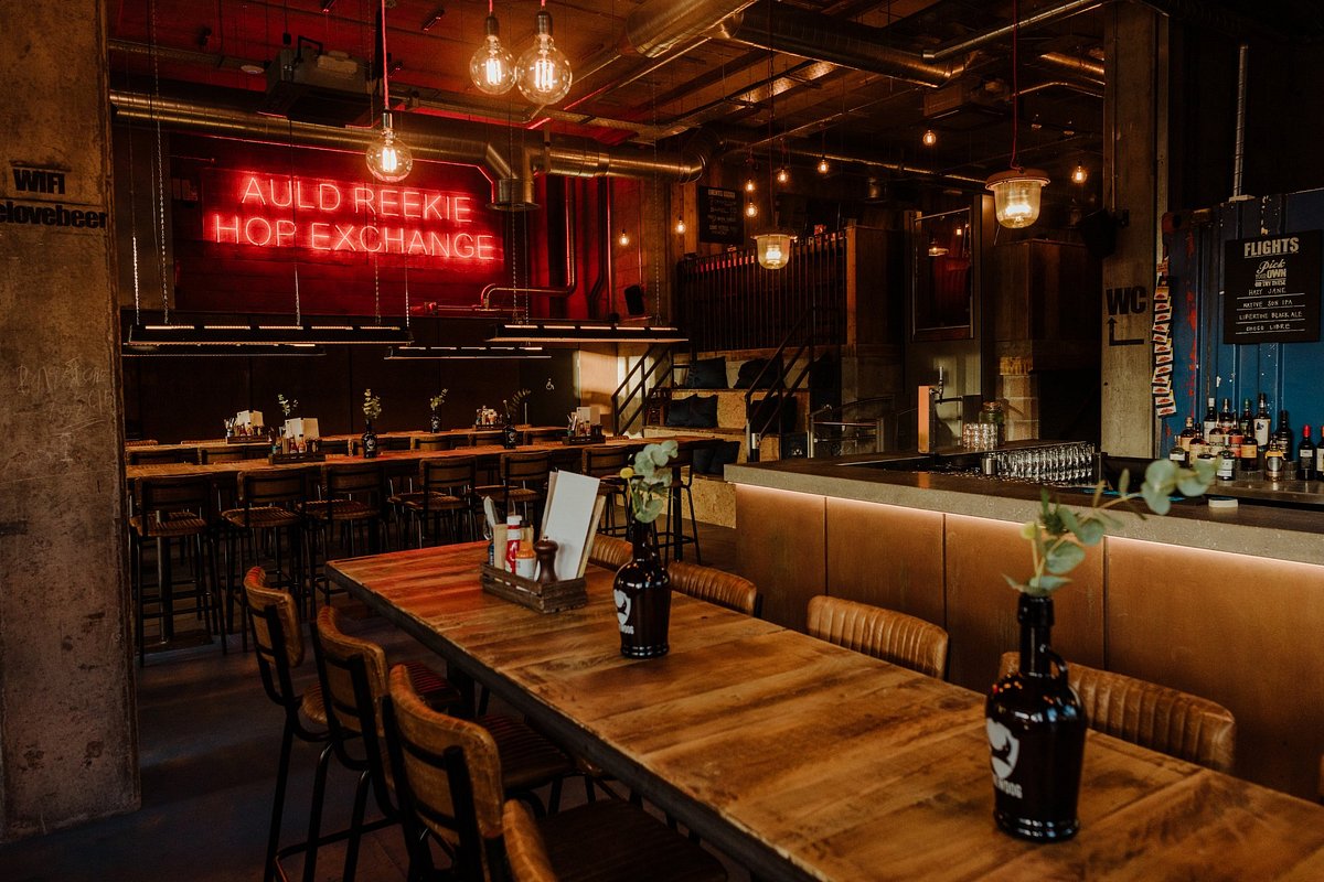 Stylish BrewDog Lothian Road bar with rustic tables, ideal for networking events.
