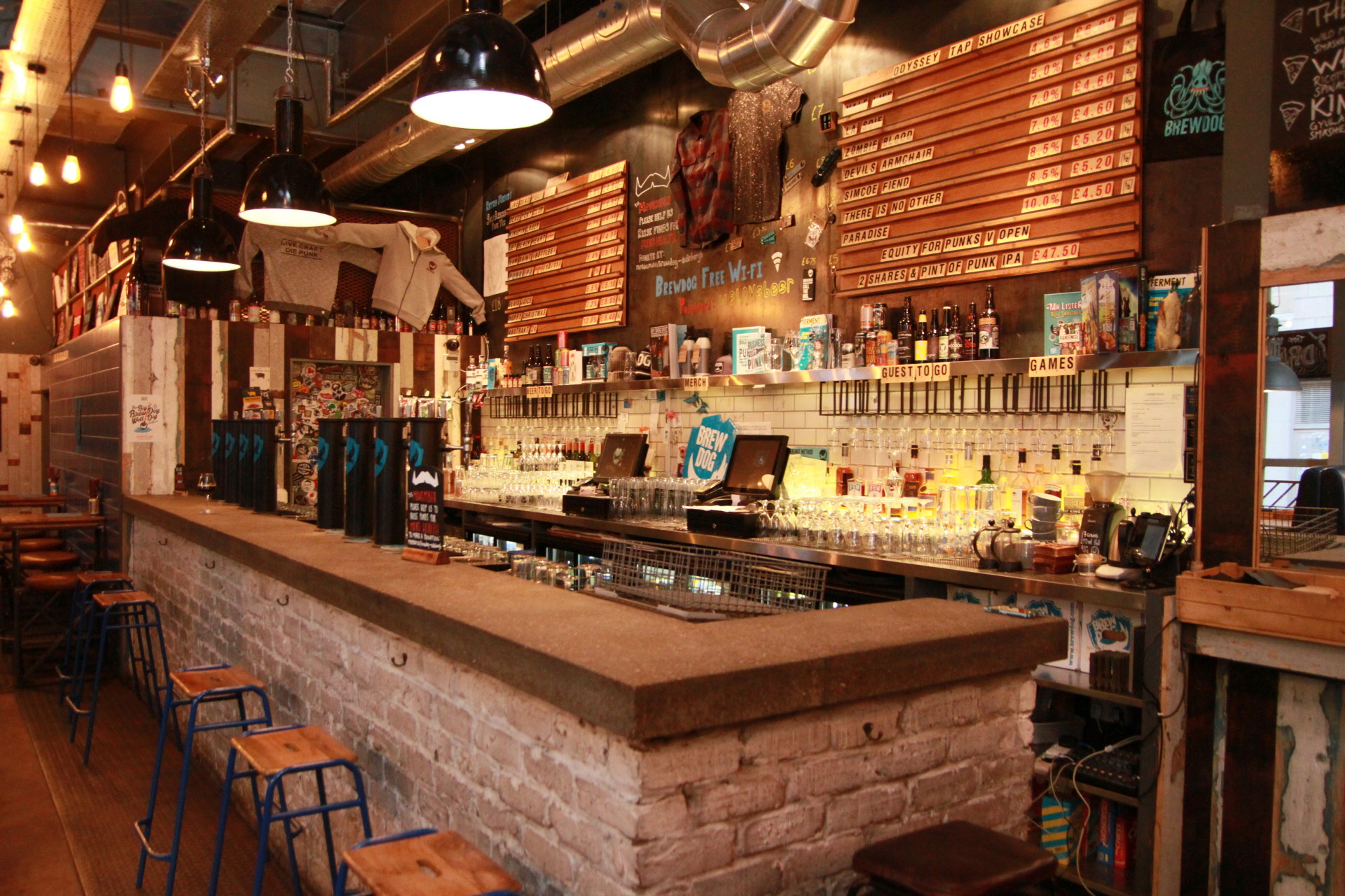 Vibrant BrewDog Edinburgh bar with warm lighting, perfect for networking events.