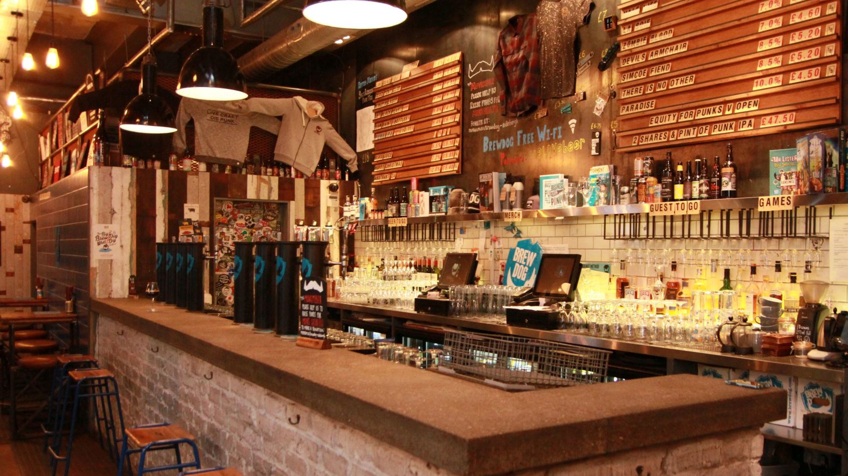 BrewDog Edinburgh Airport bar with eclectic decor for casual networking events.