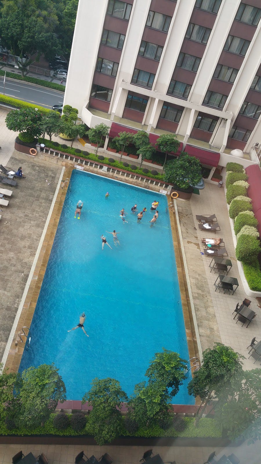 Vibrant pool scene at Diamond Room, China Hotel, ideal for networking events and leisure.