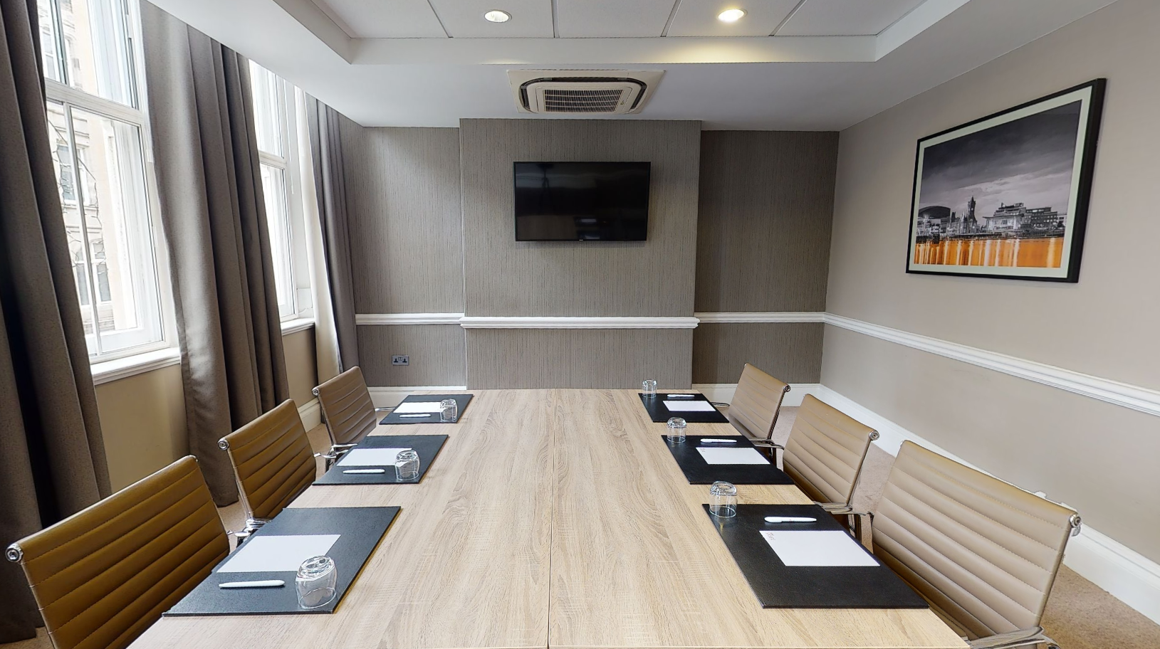 Caerphilly Suite meeting room with natural light, ideal for corporate events and workshops.