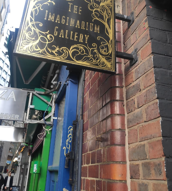 Stylish sign at The Space in Imaginarium Gallery, ideal for upscale events and gatherings.