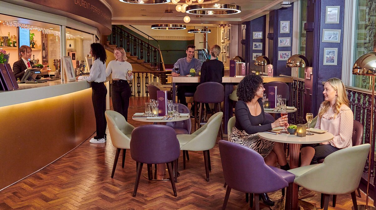 Main Dining Area at Bar du Champagne, stylish venue for networking events and meetings.
