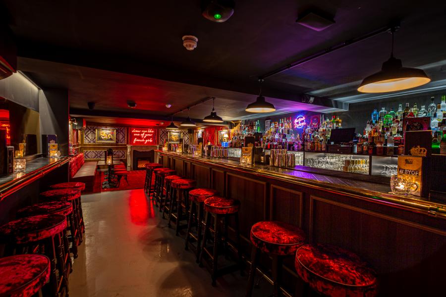 Pirates Cave bar with warm lighting, perfect for cocktail receptions and networking events.