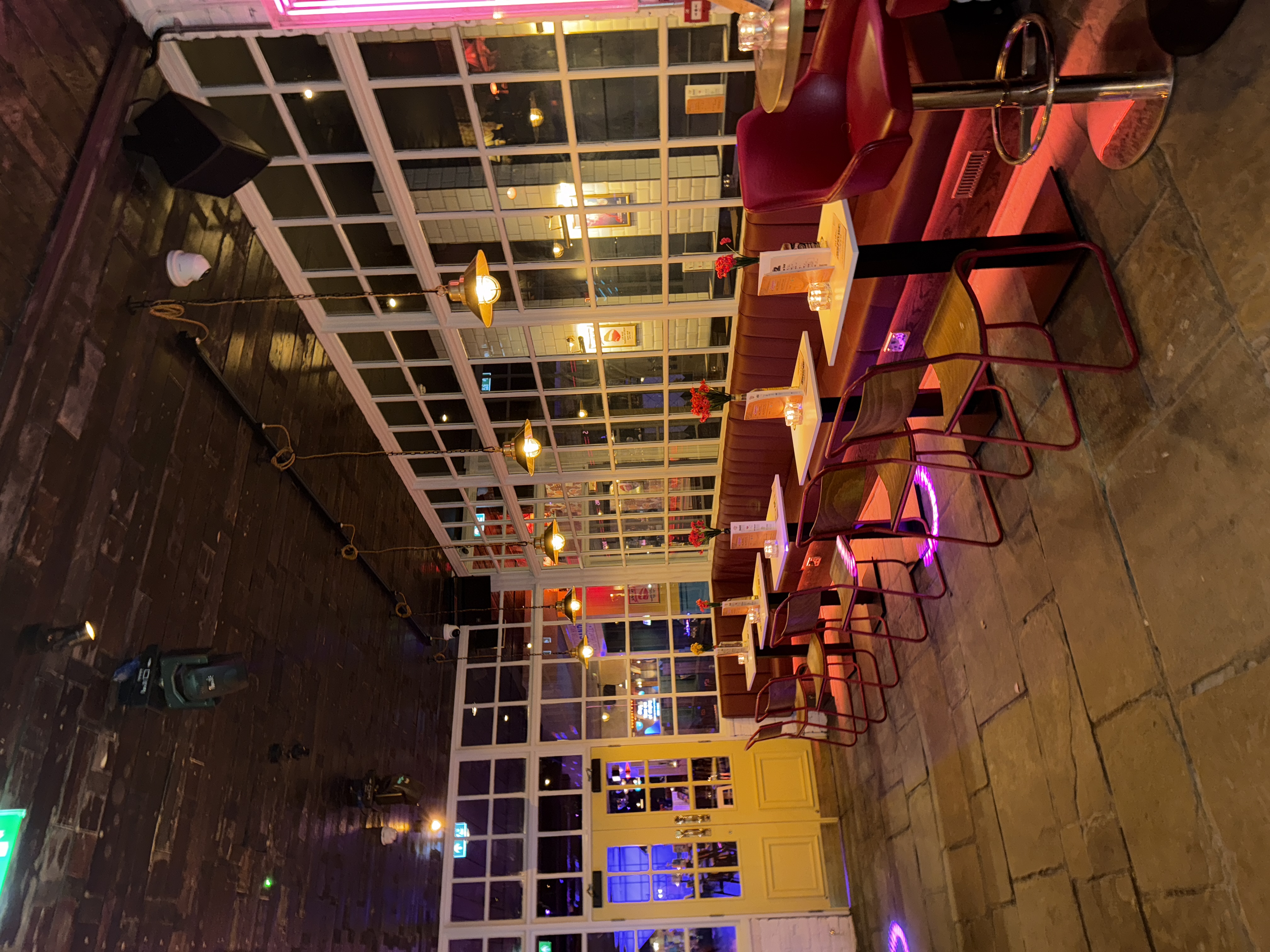 Stylish Function Room at Simmons Manchester for events with natural light and cozy seating.