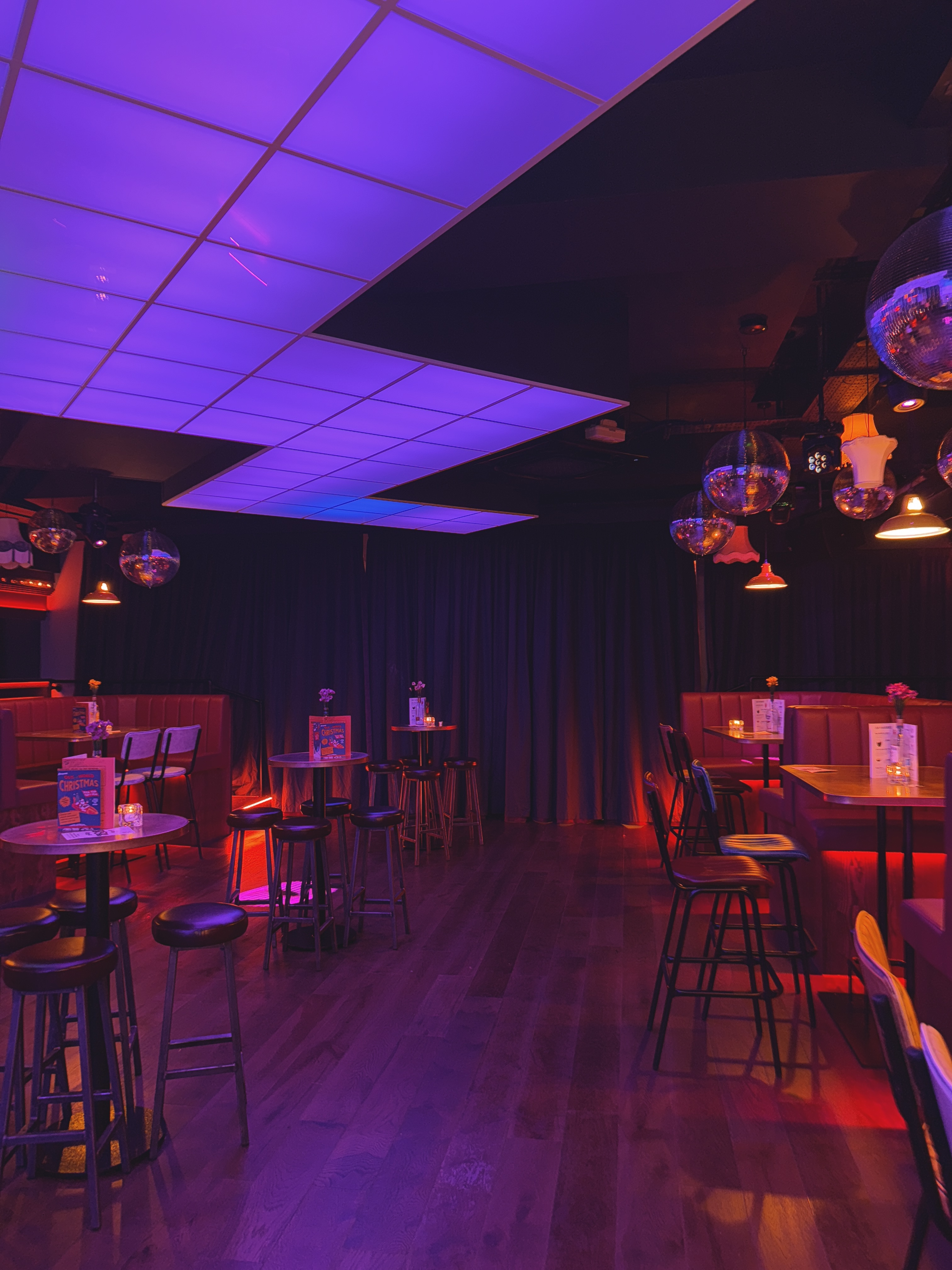 Stylish event space in Simmons Manchester with vibrant decor for networking and parties.