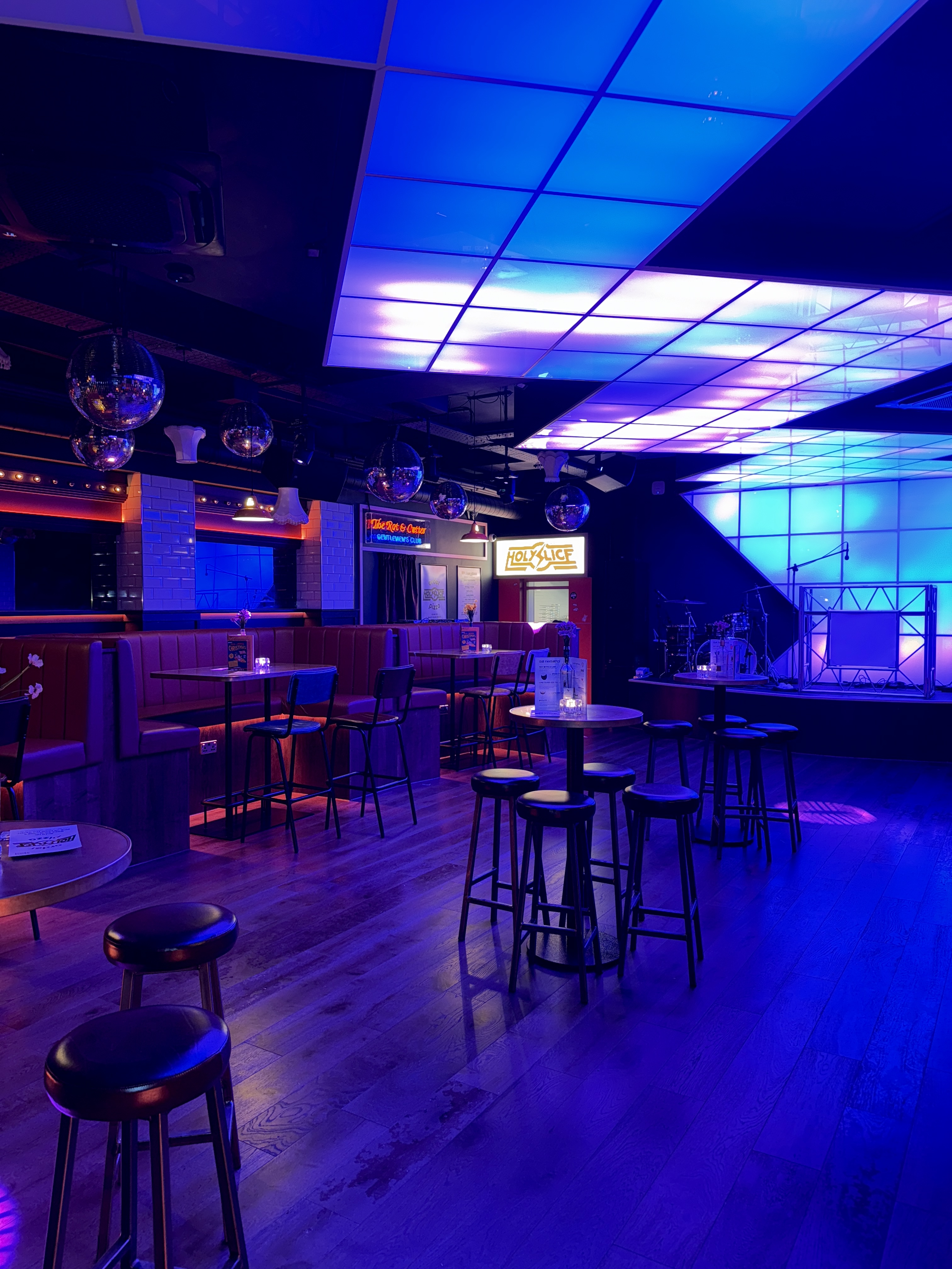 Vibrant event space in Simmons Manchester with cozy booths for parties and gatherings.