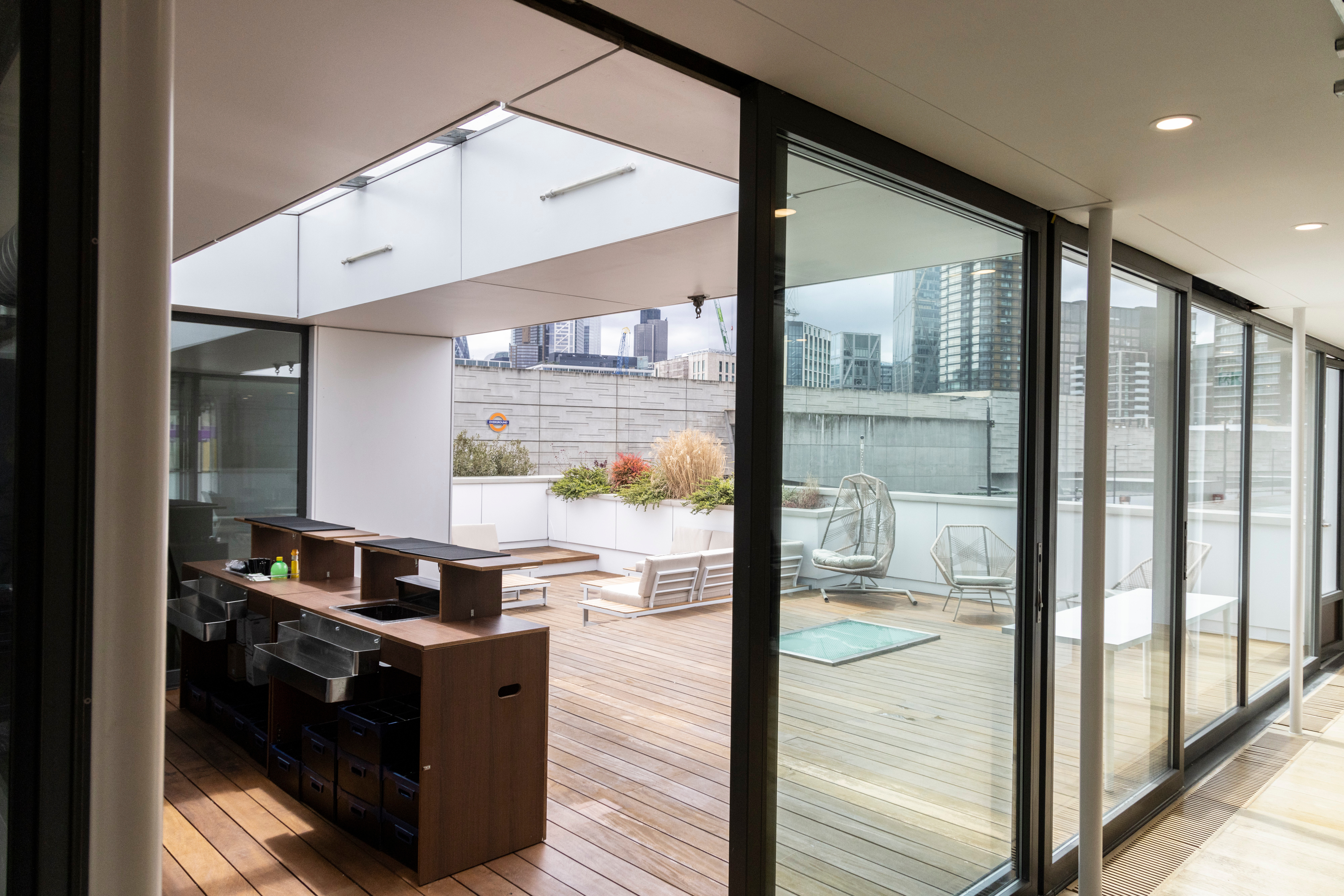 Modern event space with large windows at Sky Guild Gaming Centre for corporate and social events.