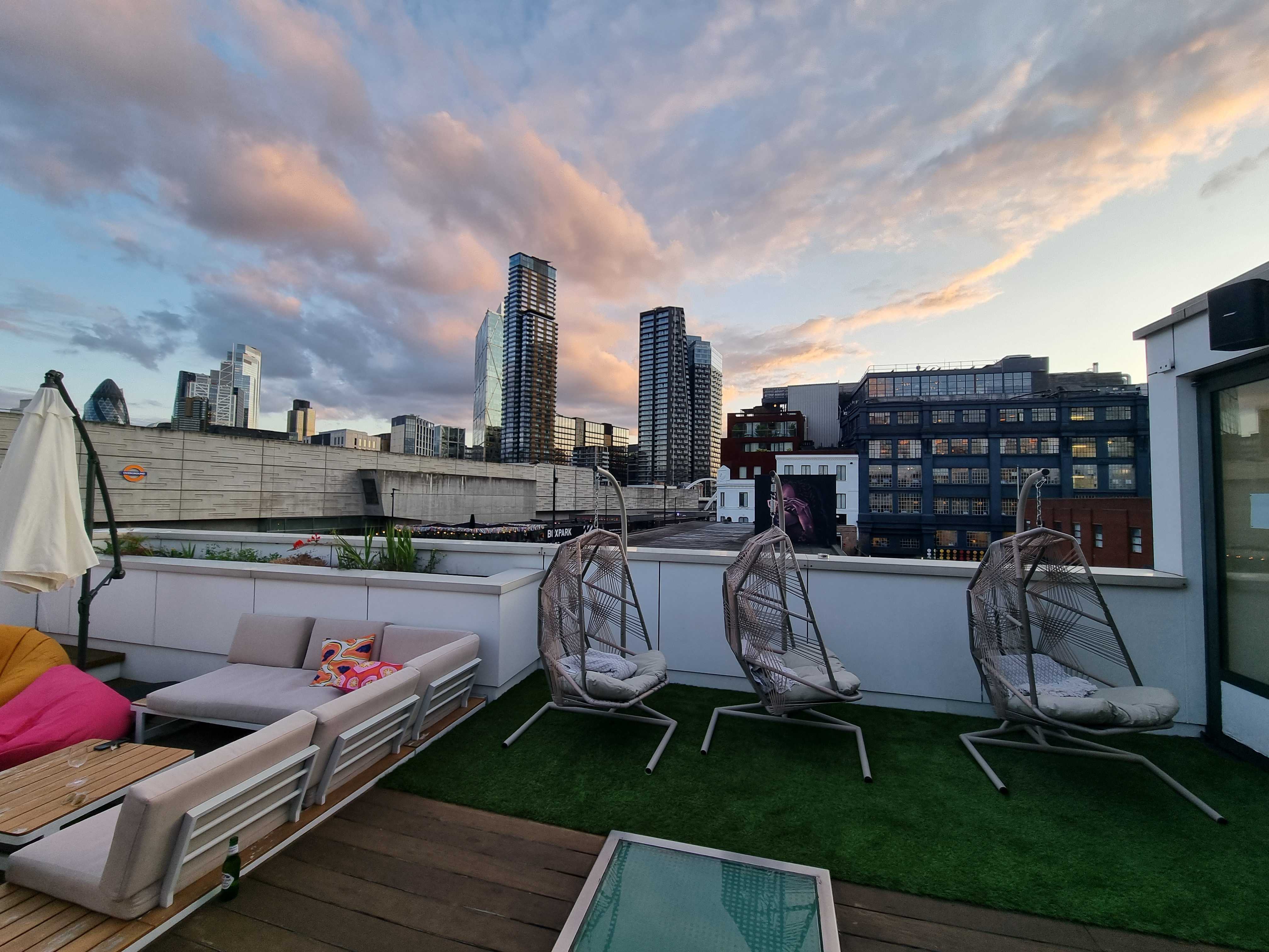 Stylish rooftop venue with skyline views, ideal for networking events and gatherings.