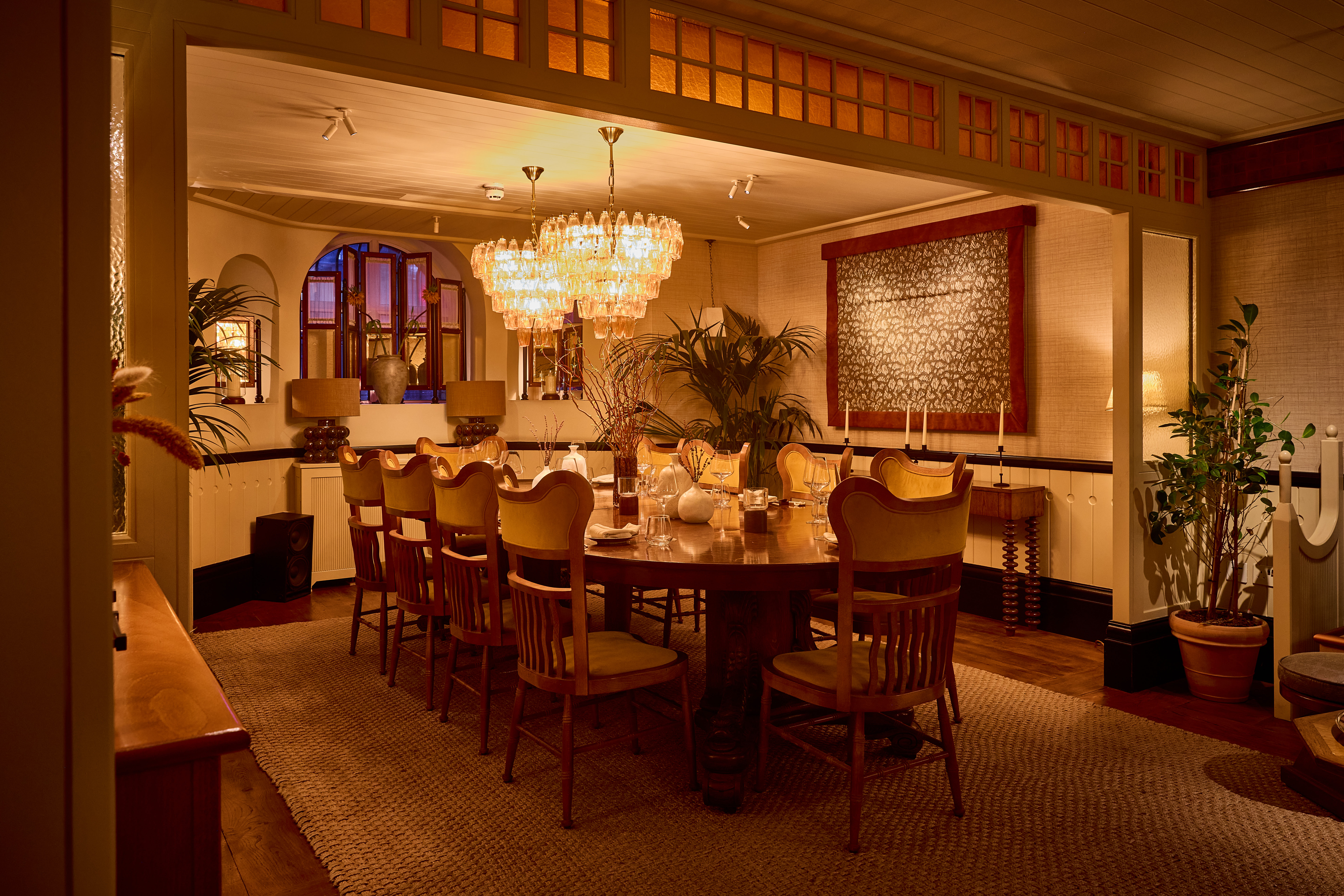 Elegant private dining room with round table, perfect for intimate events and meetings.