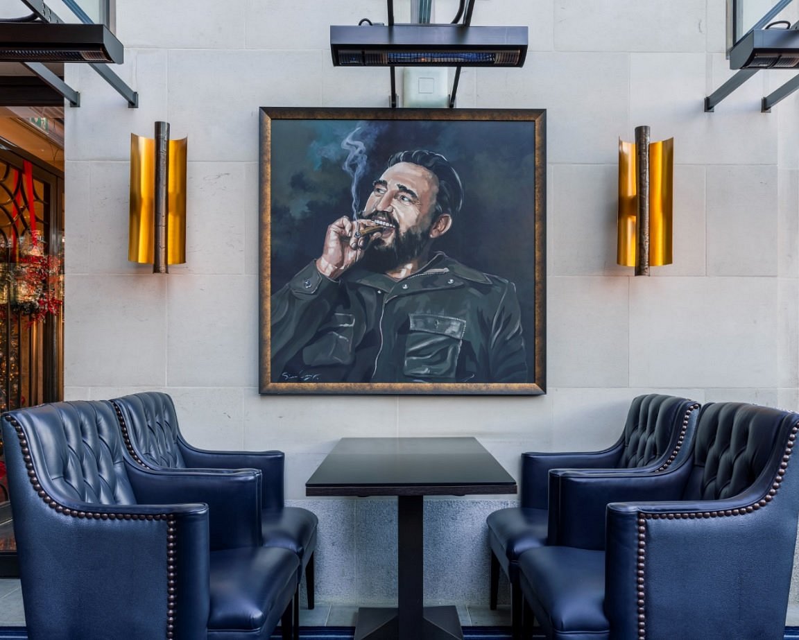 Crystal Bar at The Wellesley, London: plush seating, historical portrait for upscale events.