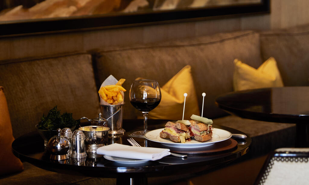 Gatsby's Room dining setup with gourmet appetizers for corporate events or celebrations.