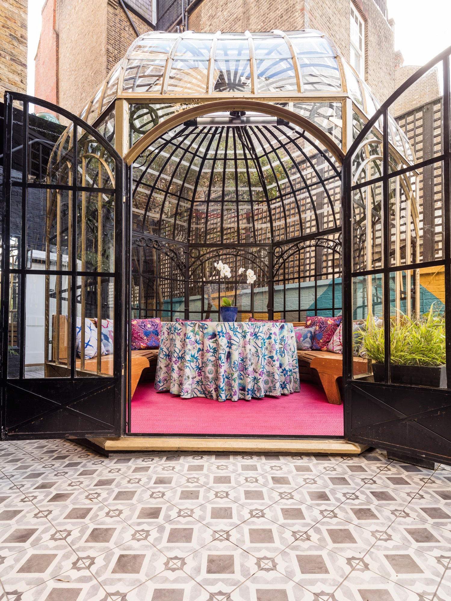 Elegant glass event space at Blakes Hotel, ideal for intimate gatherings and networking.