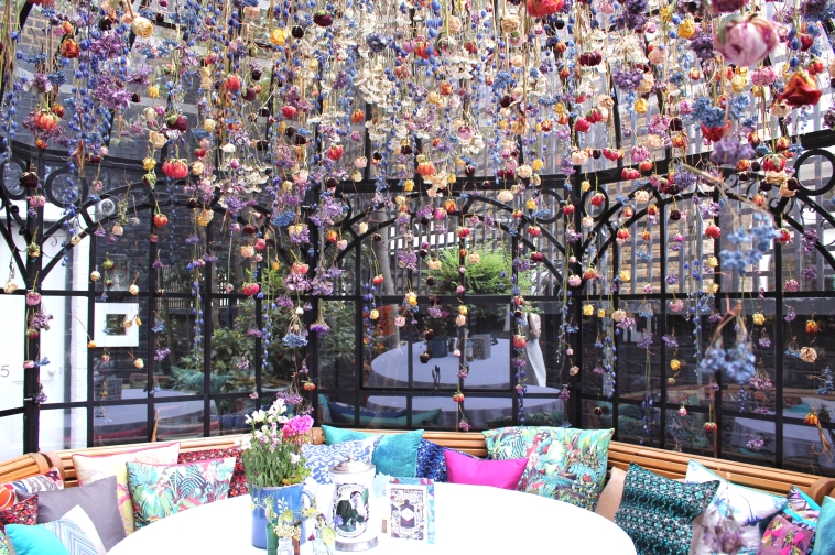 The Birdcage at Blakes Hotel: colorful flower ceiling for intimate events and workshops.