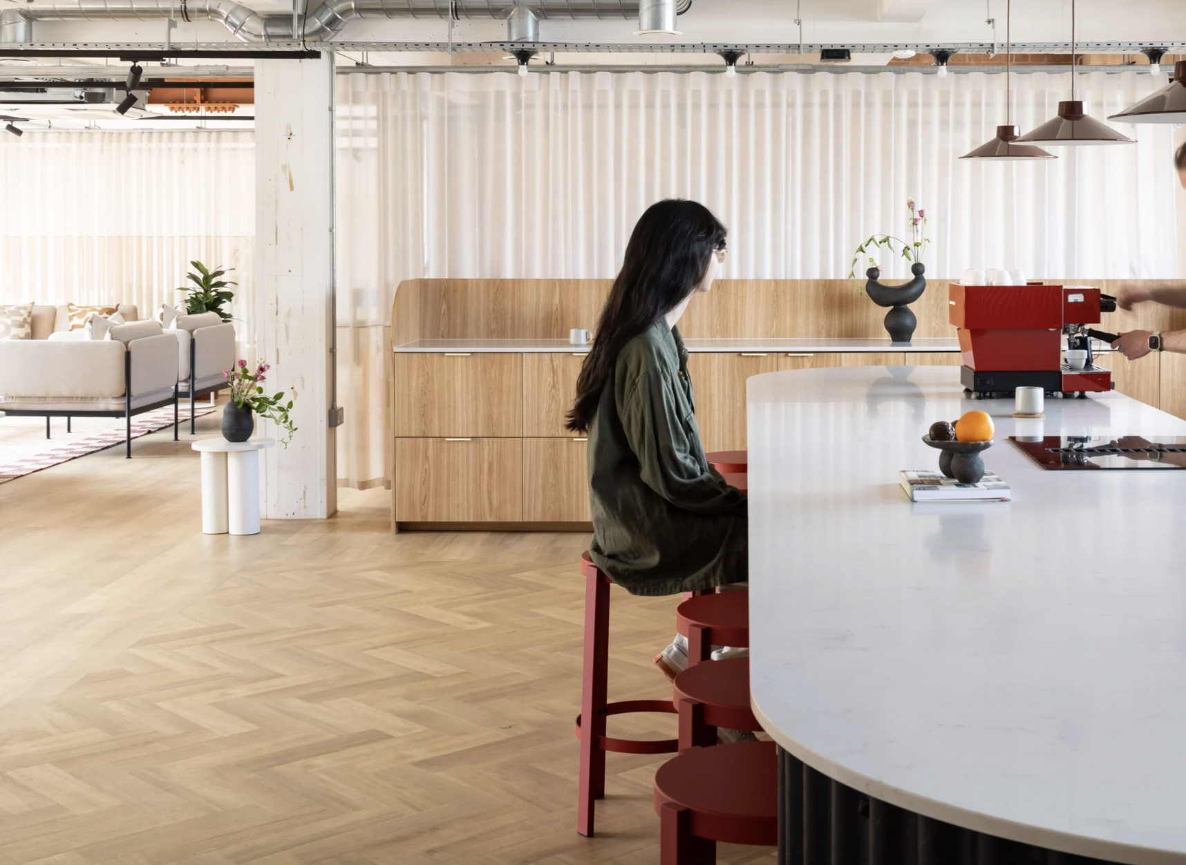 Modern meeting space at Loom Club with natural light, ideal for networking events.