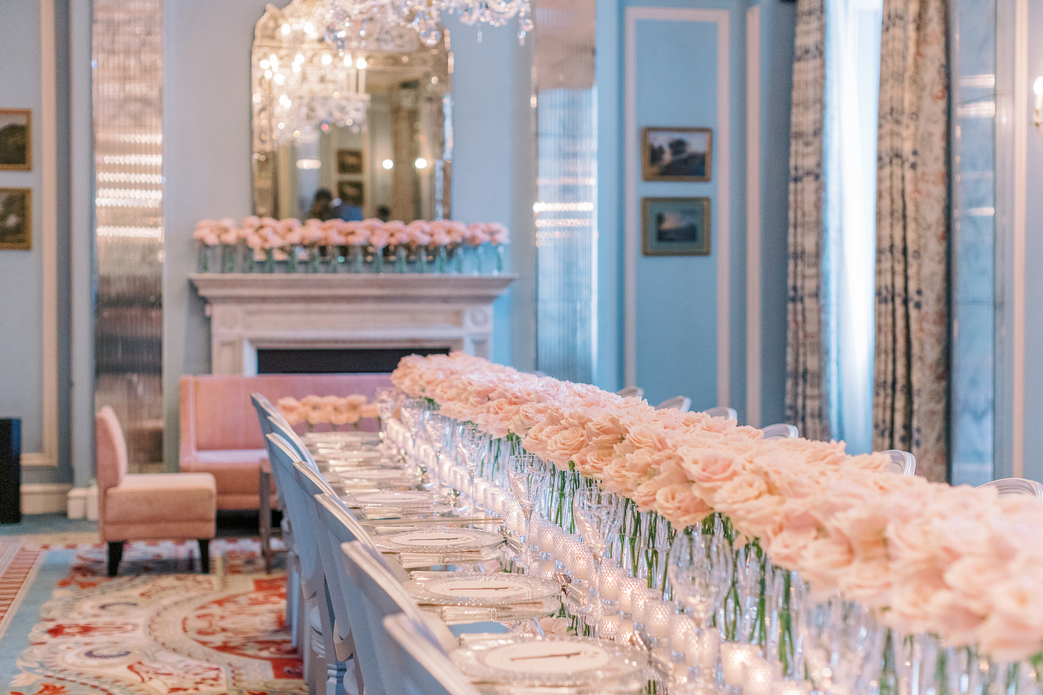 Elegant dining table with pink roses in Belgravia Ballroom, perfect for upscale events.