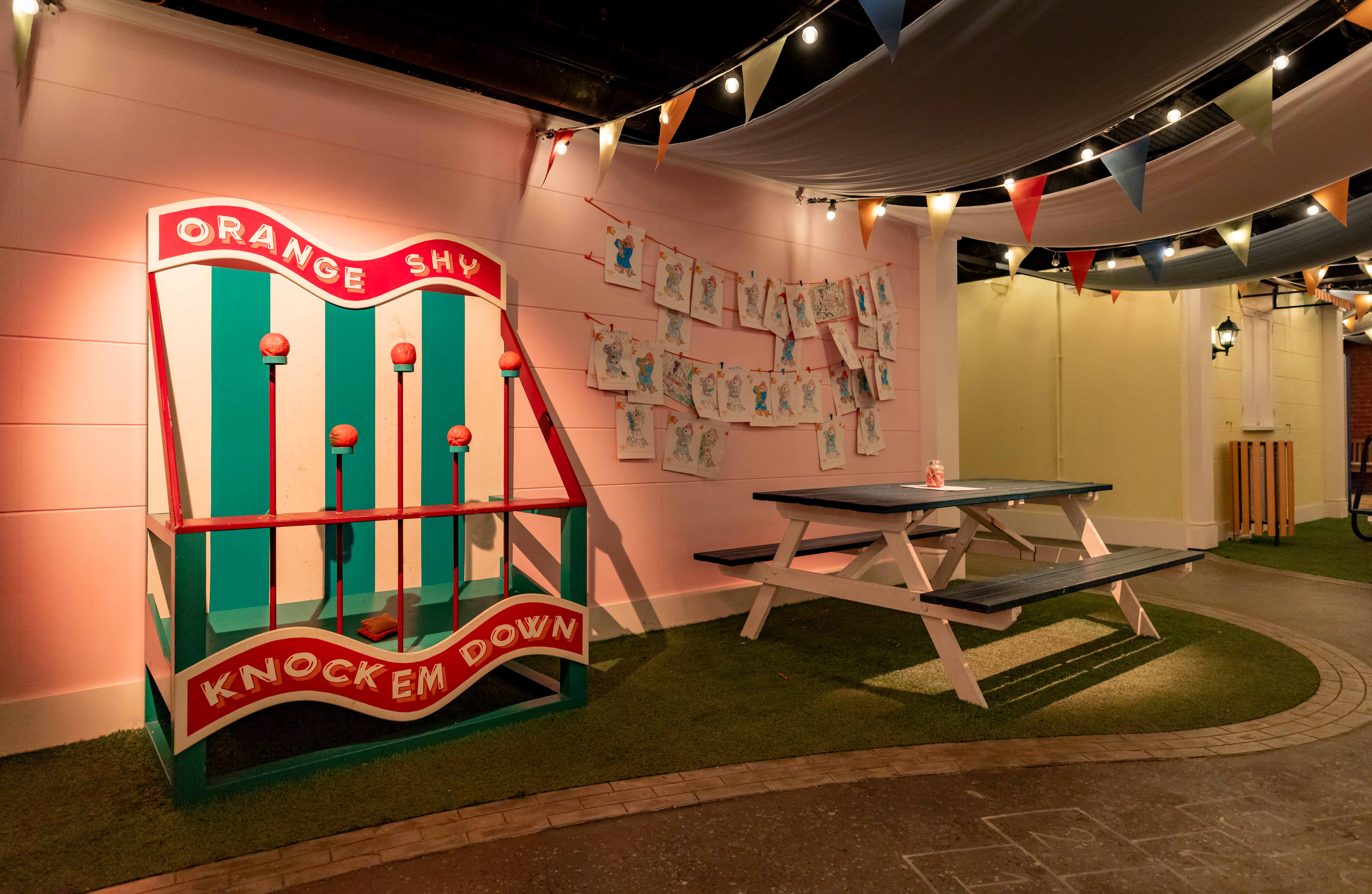 Windsor Gardens at Paddington Bear Experience with carnival game for team-building events.