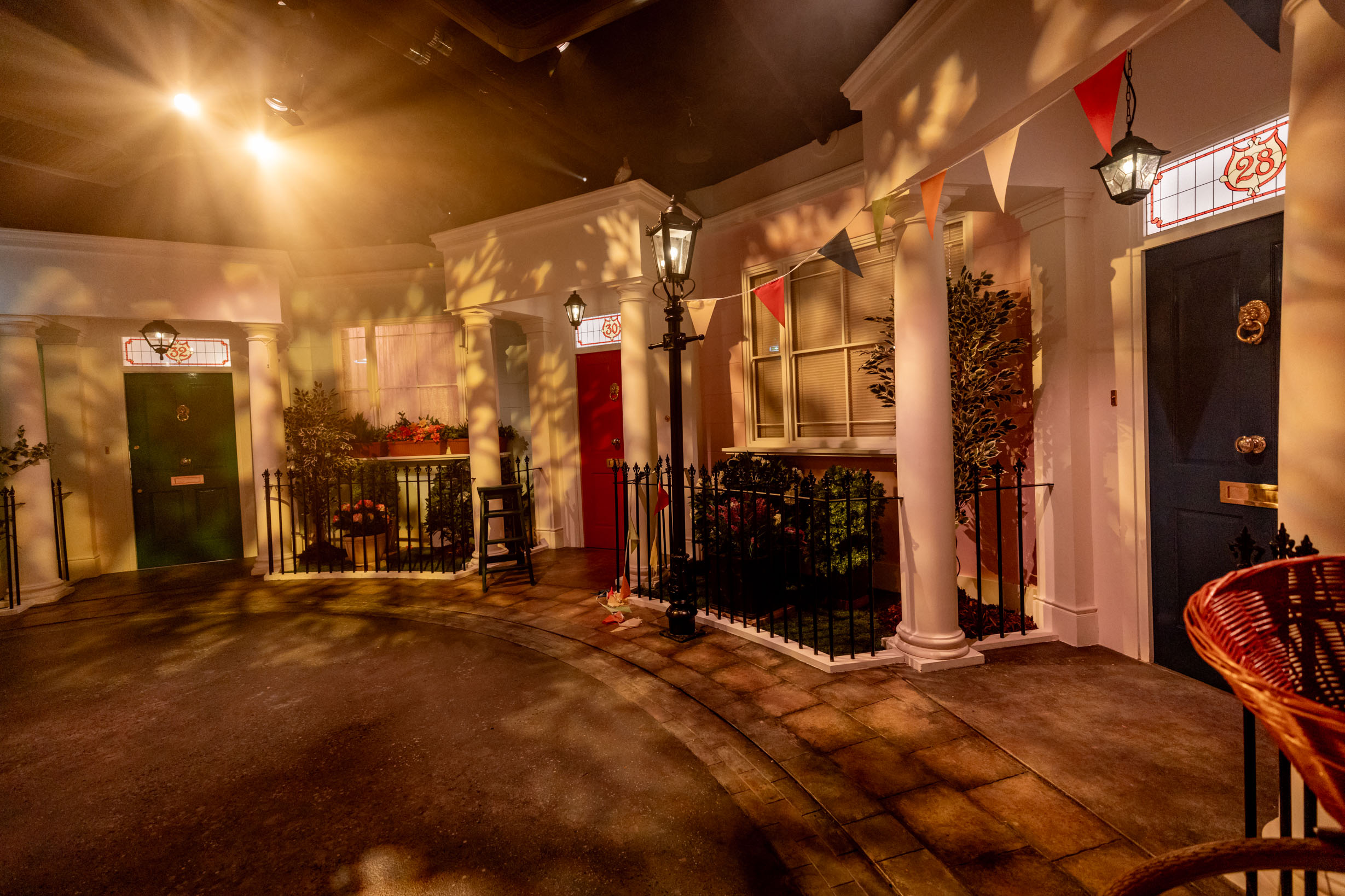 Windsor Gardens event space with colorful doors, perfect for themed gatherings and networking.