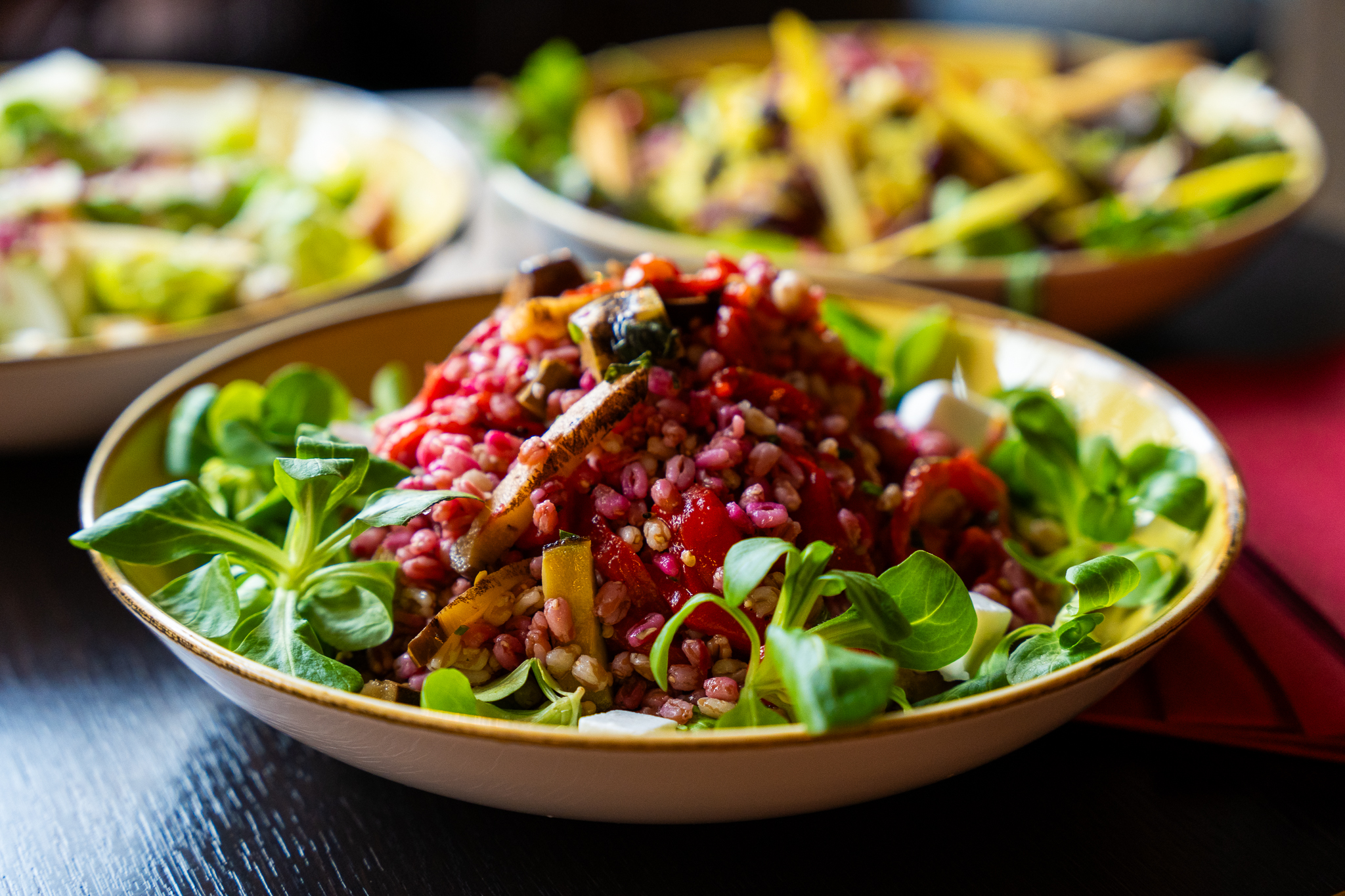 Vibrant salad presentation at Top Hat Restaurant & Bar for exclusive event catering.