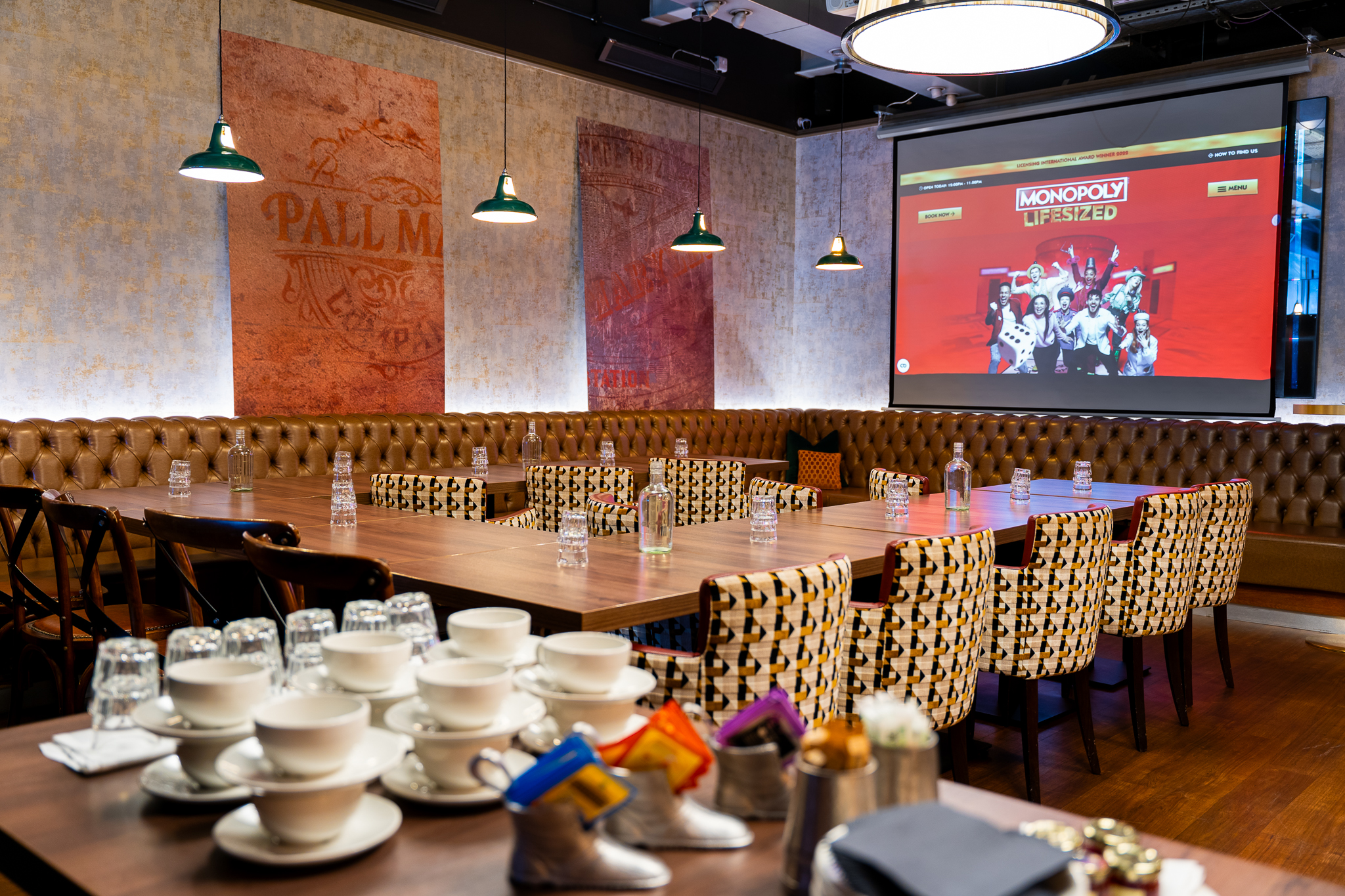 Semi-private hire meeting space with large table at Top Hat Restaurant & Bar.
