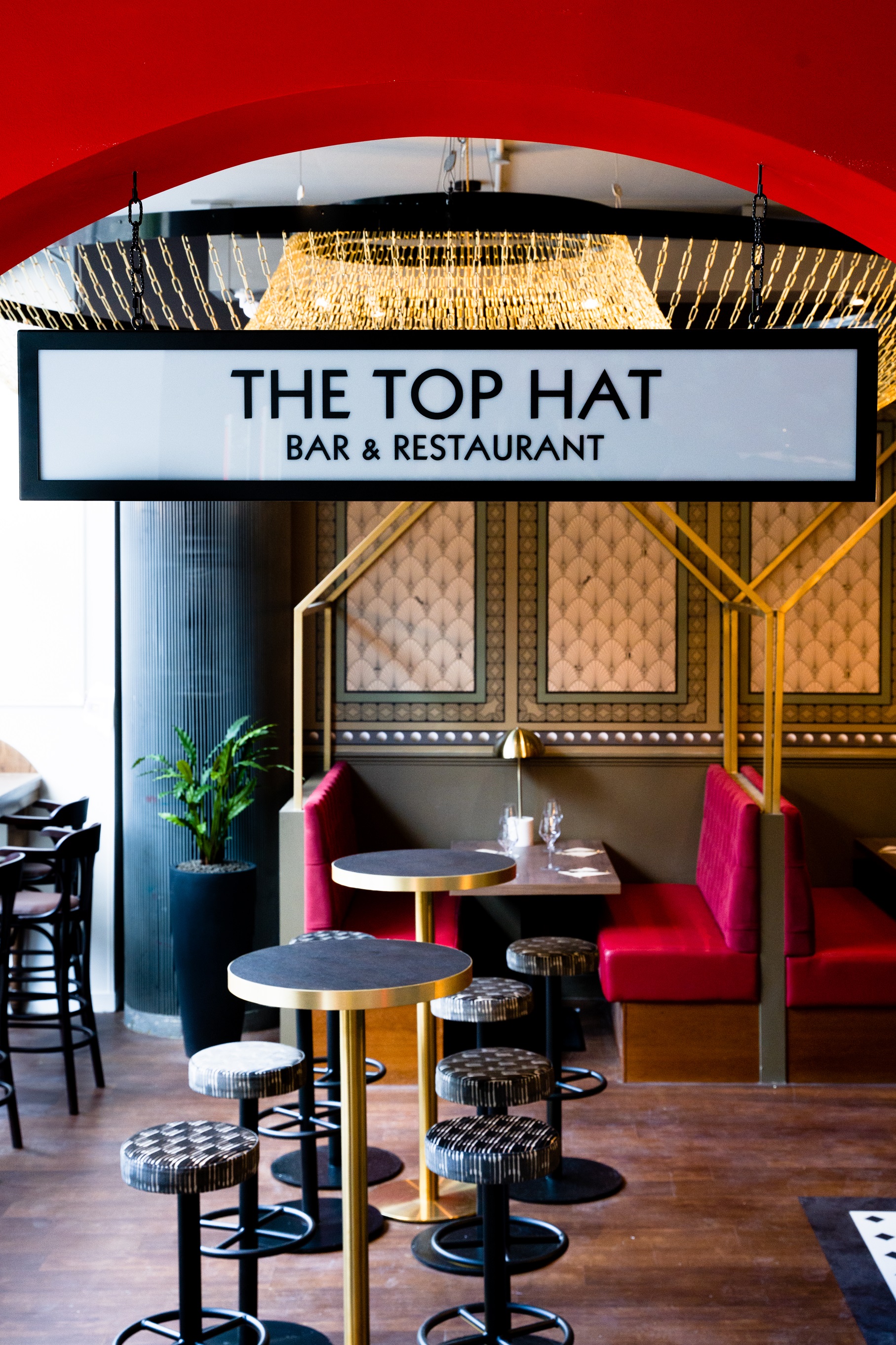 Semi-private hire at Top Hat Restaurant & Bar with elegant decor for social events.