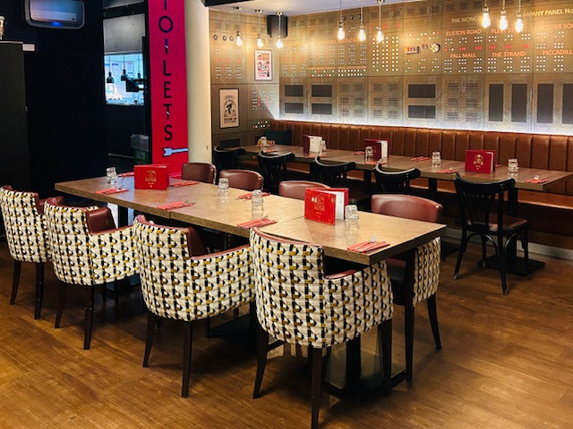 Semi-private dining space in Top Hat Restaurant, ideal for meetings and events.