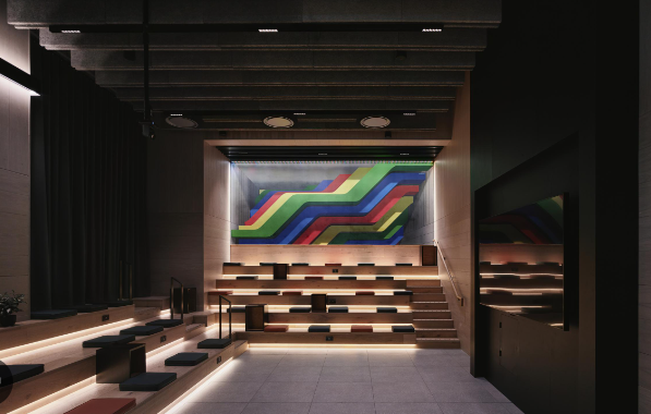 Modern auditorium with tiered seating for dynamic events and presentations.