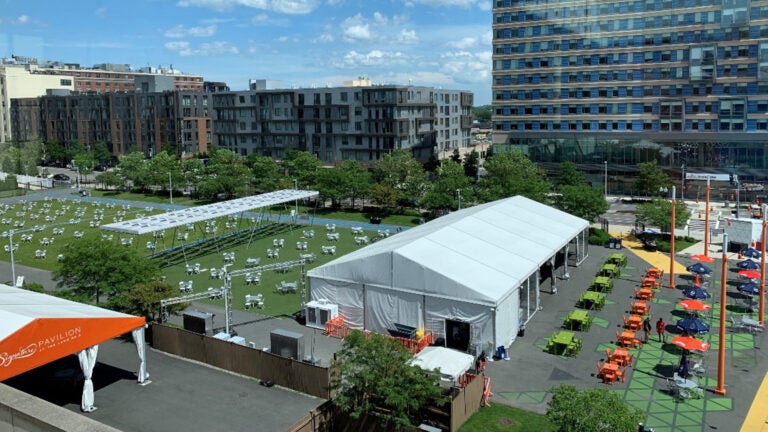 Outdoor event space at The Lawn On D with a large tent and vibrant seating.