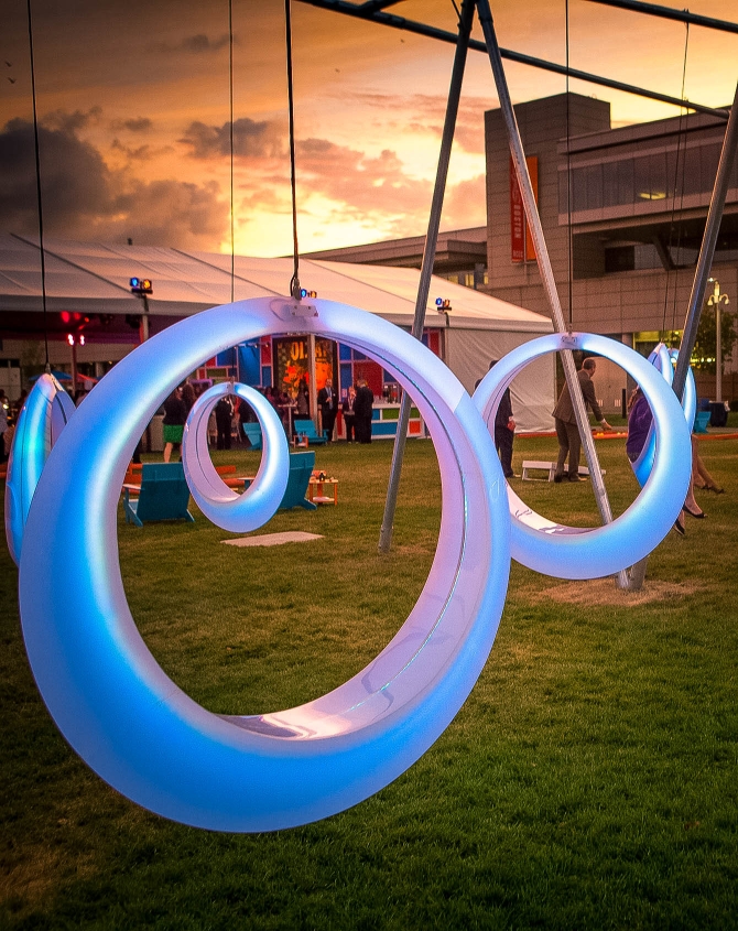 Vibrant outdoor event space with illuminated sculptures at The Lawn On D.