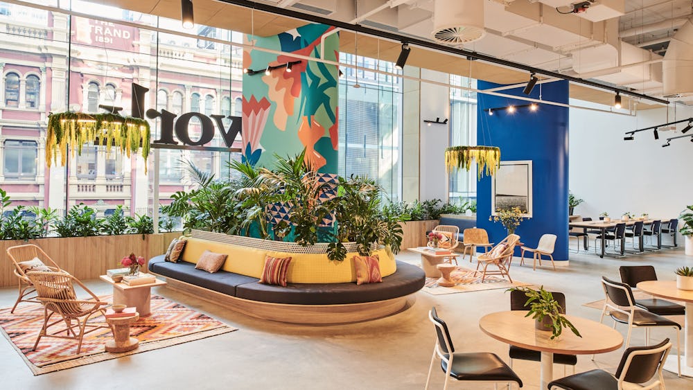 Modern WeWork event space with vibrant decor for meetings and workshops.