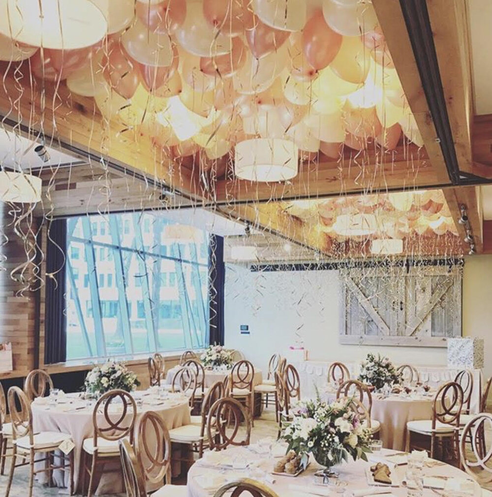 Elegant private dining room with floral arrangements, perfect for weddings and receptions.