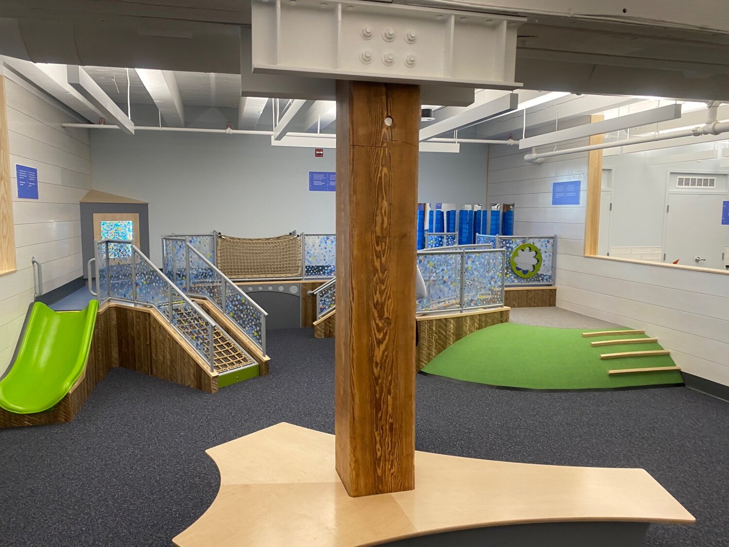 Play Space at Boston Children's Museum with slides, ideal for family events and team-building.
