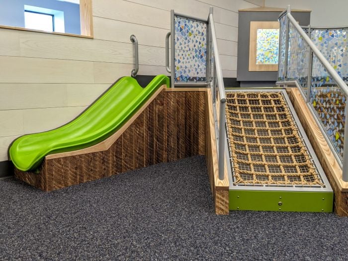 Vibrant slide in Boston Children's Museum's Play Space for creative team events.
