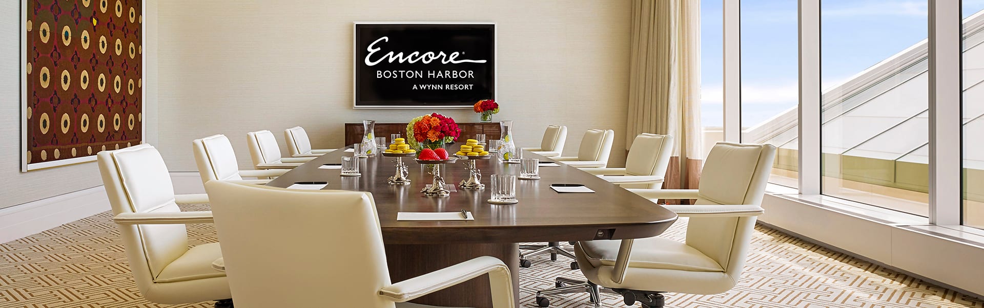 Executive Boardroom at Encore Boston Harbor, modern design, ideal for corporate meetings.