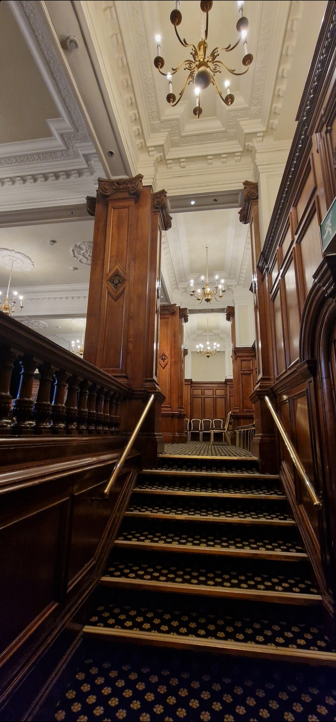 Stanley Suite at The Midland Hotel: elegant event space with wooden paneling for upscale gatherings.