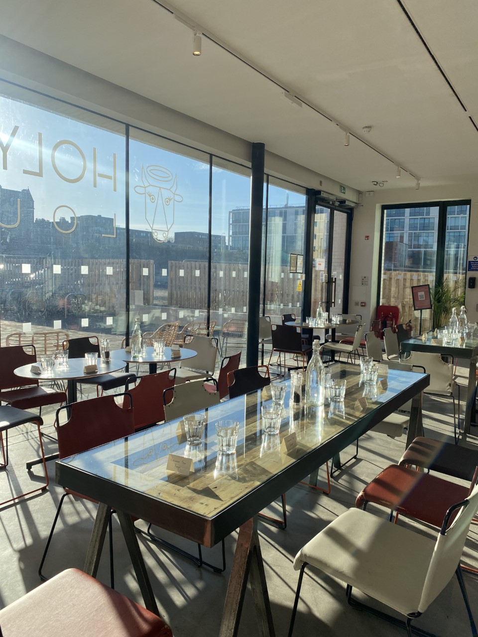 Bright modern café and courtyard in Edinburgh Printmakers, perfect for networking events.