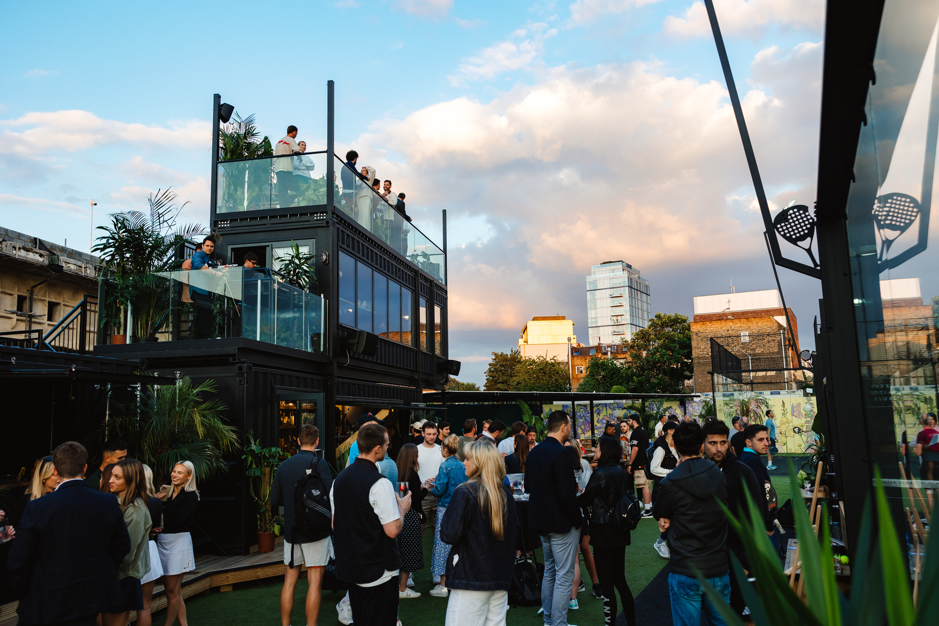 Vibrant rooftop venue hire at Padel Social Club for networking and social events.
