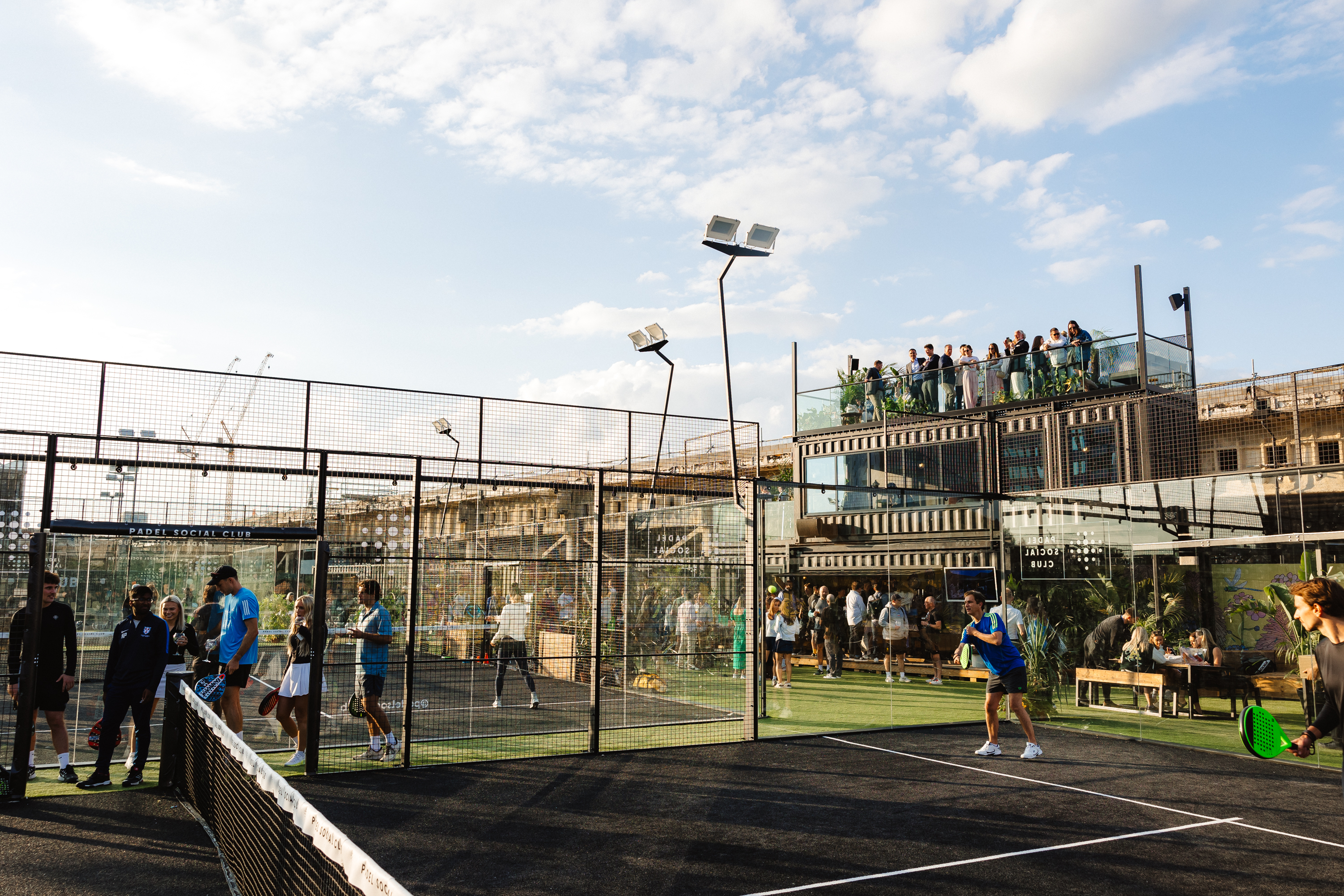 Vibrant outdoor venue at Padel Social Club for corporate events and networking.