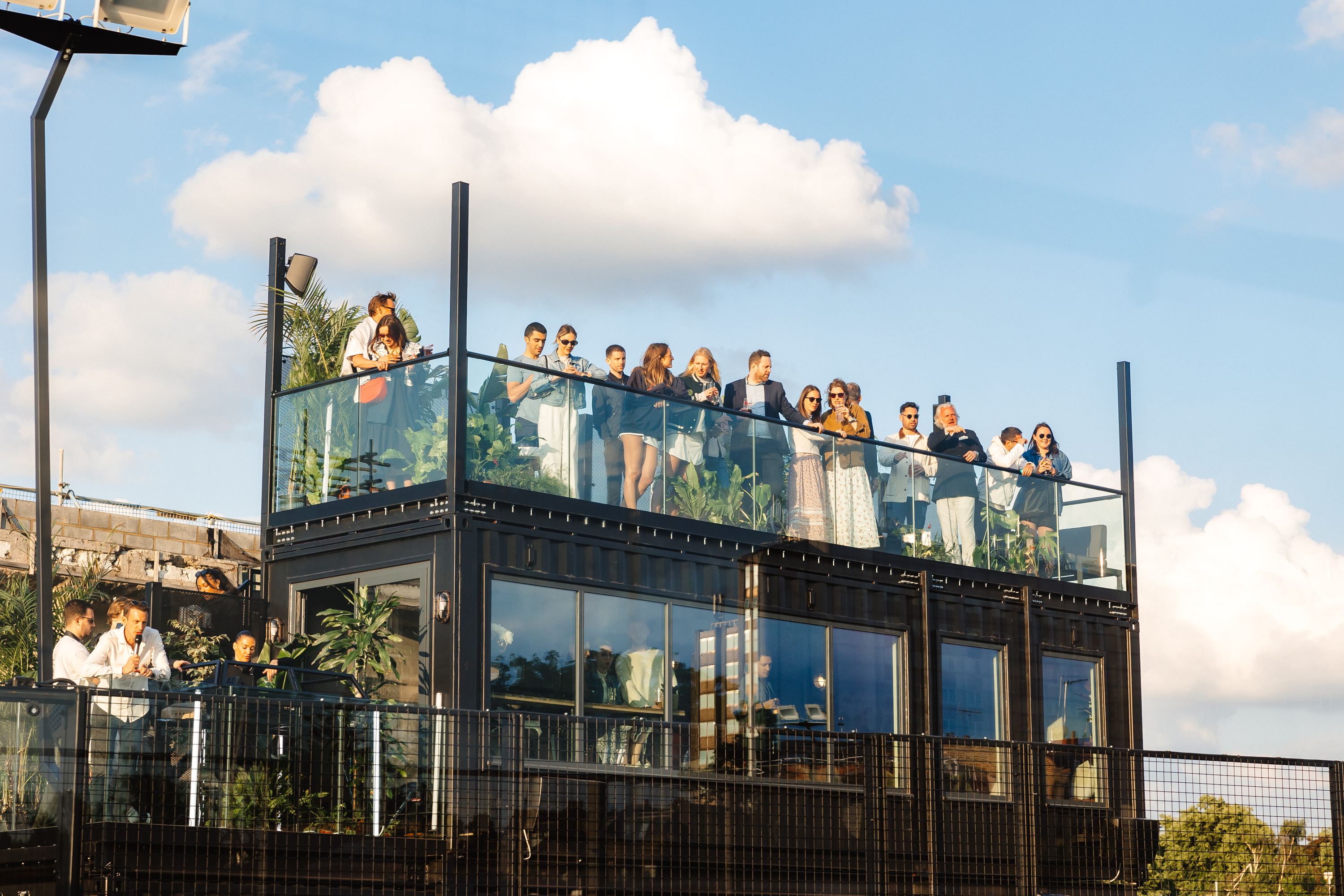 Vibrant rooftop venue at Padel Social Club for networking and social events.