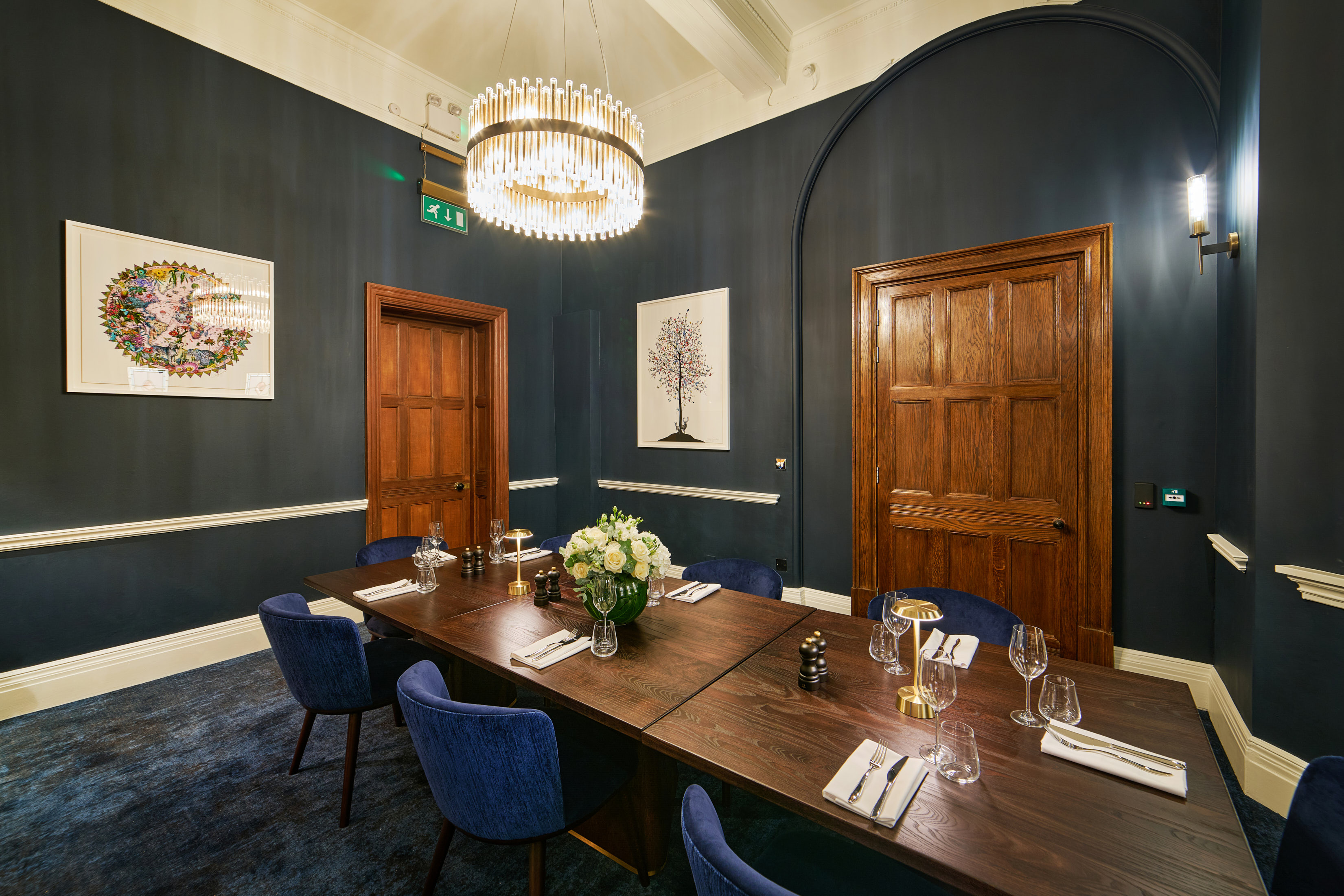 Private dining room with elegant decor, ideal for corporate meetings and intimate gatherings.