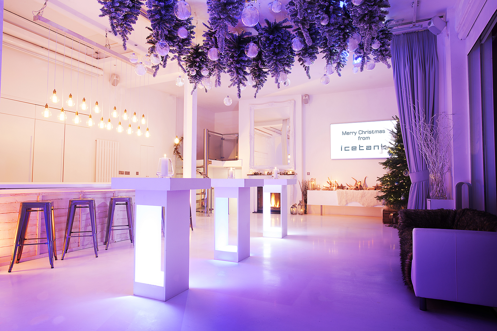 Modern event space with sleek decor for Christmas parties and corporate gatherings.