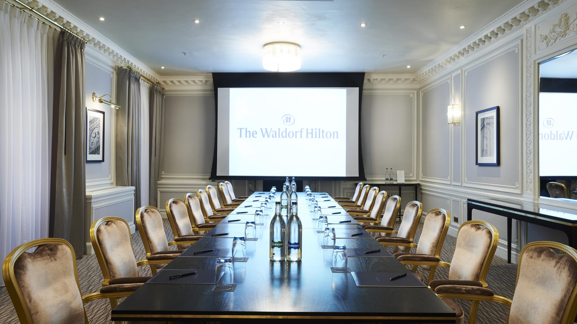 Sophisticated meeting room at The Waldorf Hilton, ideal for corporate events and gatherings.