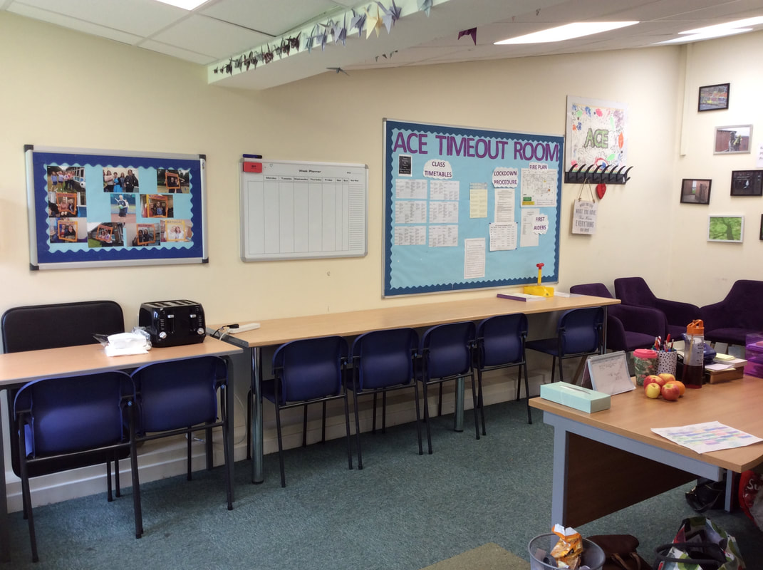 Classroom at ACE Language School, featuring a long table for workshops and discussions.