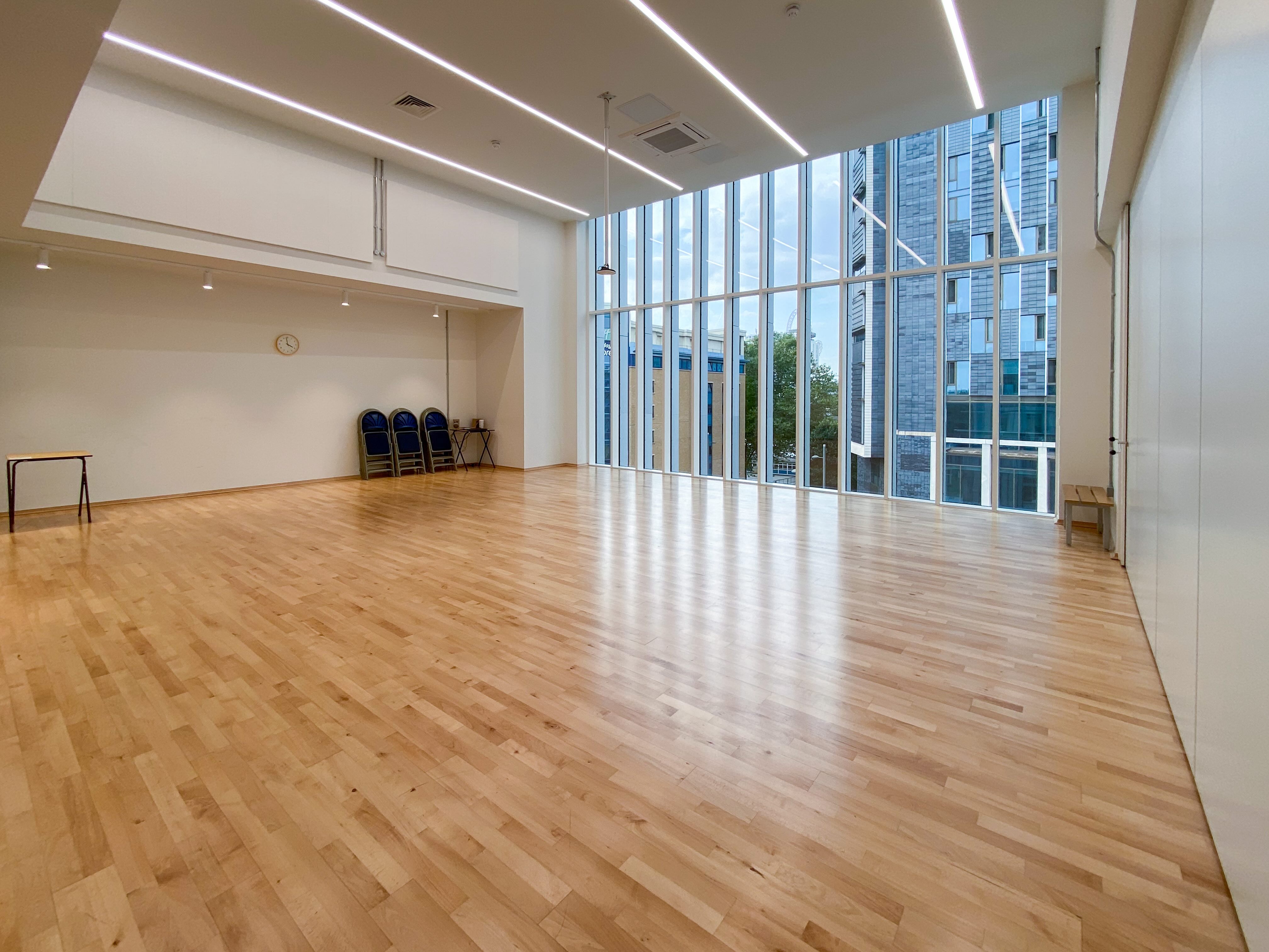 Wellbeing & Performance Studio: spacious event space with large windows for workshops and receptions.