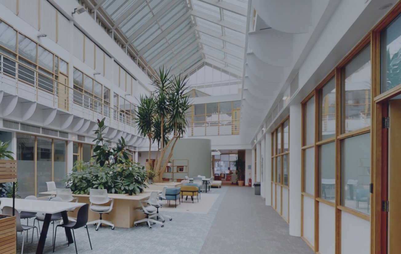 Modern atrium in Cambridge Innovation Parks, ideal for meetings and networking events.