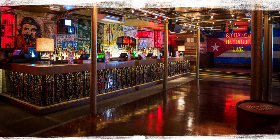 Vibrant cocktail bar with eclectic decor, perfect for social gatherings and events.